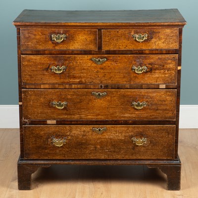 Lot 1170 - A George III oak and mahogany-veneered chest of drawers