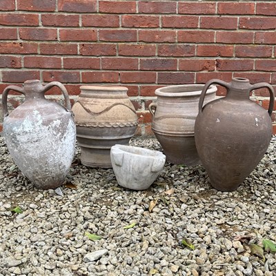 Lot 1476 - A collection of five decorative garden ornaments