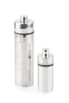 Lot 720 - Two graduated silver pepper grinders, of plain...