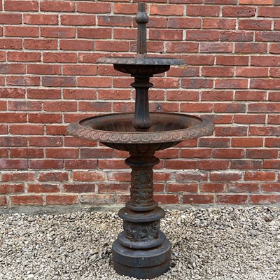 Lot 1429 - A cast iron two-tier fountain