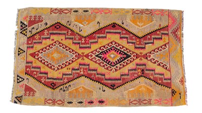 Lot 1022 - A mid-20th century hand-woven Anatolian-style Kilim
