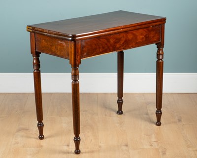 Lot 530 - A Georgian mahogany fold-over breakfast table