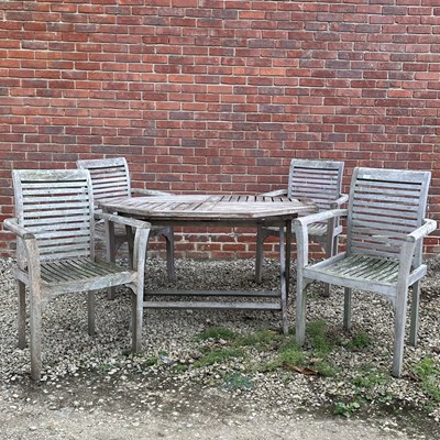 Lot 1414 - A suite of teak garden furniture