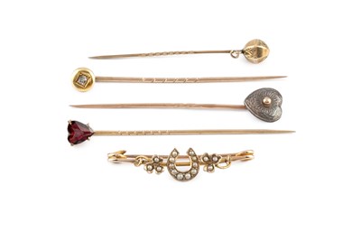 Lot 209 - A half pearl bar brooch, modelled as a...