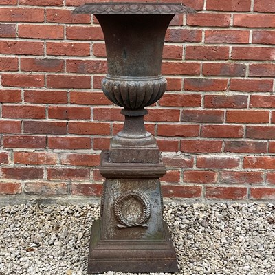 Lot 1400 - A French cast iron urn of campana form