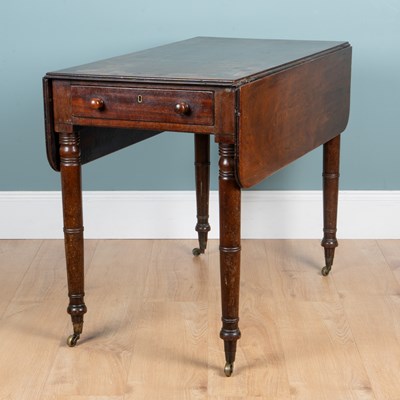 Lot 410 - A 19th century mahogany drop-leaf table