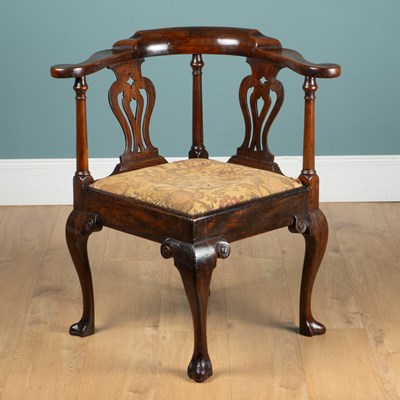 Lot 1351 - A George III mahogany corner chair