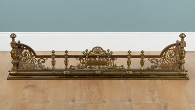 Lot 1319 - A late Victorian heavy brass fender