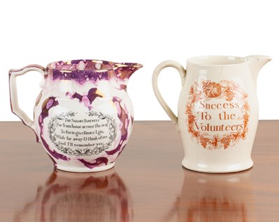 Lot 1094 - A creamware jug and a lustreware jug