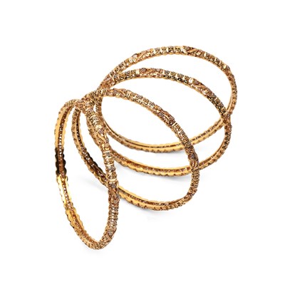 Lot 343 - Set of four yellow precious metal bangles...