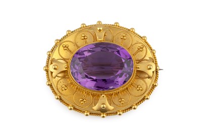 Lot 39 - A Victorian amethyst set brooch/pendant, the...