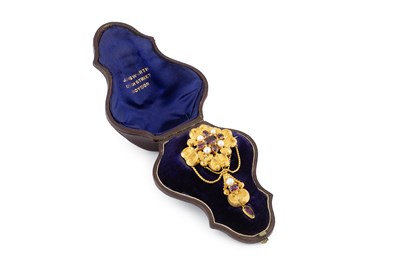 Lot 24 - A Victorian garnet and half pearl brooch, the...