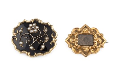 Lot 54 - Two Victorian memorial brooches, the first...