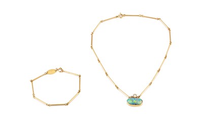 Lot 93 - An opal and diamond pendant necklace, the oval...