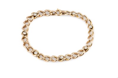 Lot 46 - A diamond set bracelet, of curb-link design,...
