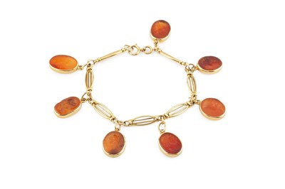Lot 69 - A hardstone intaglio bracelet, designed as a...