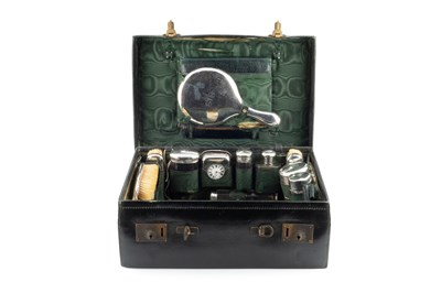 Lot 750 - An early 20th century dressing case, fitted...