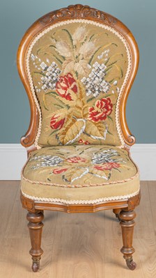 Lot 1067 - A Victorian walnut-framed nursing chair