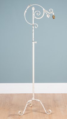 Lot 1066 - A white-painted wrought iron standard lamp