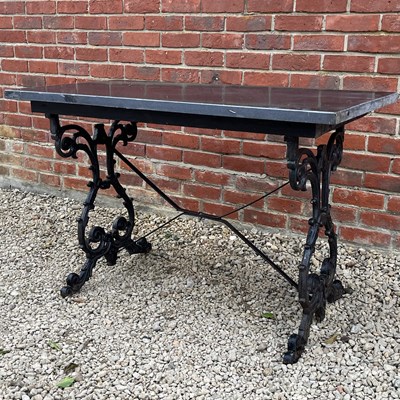Lot 1470 - A granite-topped garden table