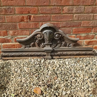 Lot 1440 - A pair of cast iron overmantels