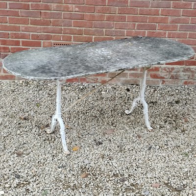 Lot 1451 - A marble-topped garden table