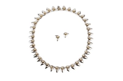 Lot 271 - A two colour necklace and ear studs suite by...