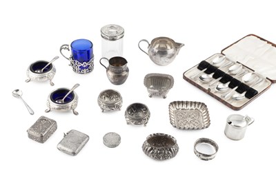 Lot 774 - A pair of Indian silver circular salts, relief...