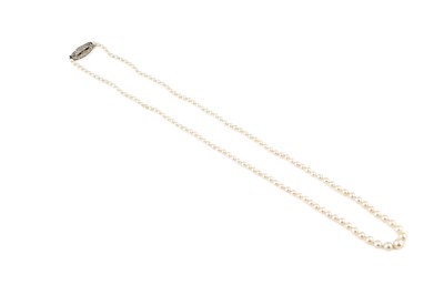 Lot 91 - A pearl necklace with diamond set clasp,...