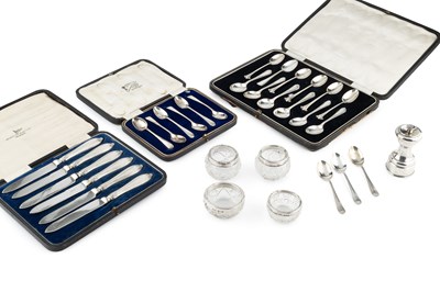 Lot 789 - Three sets of six silver teaspoons, in two...