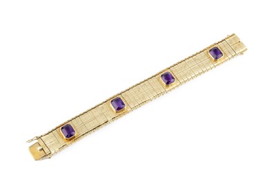 Lot 76 - An amethyst set bracelet, designed as an...