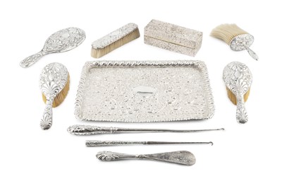Lot 753 - An Edwardian silver dressing table tray, of...