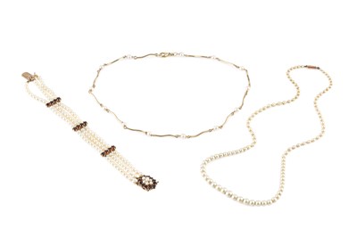 Lot 211 - A cultured pearl and garnet set bracelet, with...