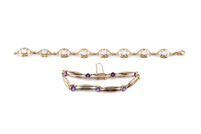 Lot 428 - Two stone set bracelets, comprising an...