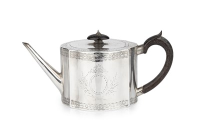 Lot 799 - A George III silver teapot, of shaped oval...