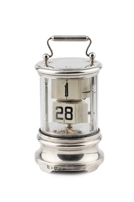 Lot An Edwardian silver 'flip' timepiece, of...