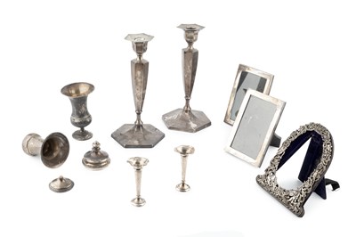 Lot 808 - A pair of George V silver candlesticks, of...
