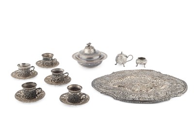 Lot 824 - An Egyptian silver circular butter dish and...