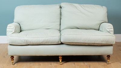 Lot 179 - A Howard sofa
