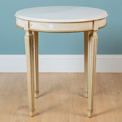 Lot 215 - A marble topped occasional table