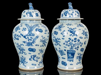 Lot 461 - A pair of Chinese blue and white jars and covers
