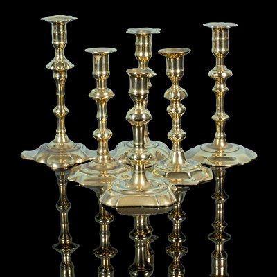 Lot 12 - A group of six brass candelsticks