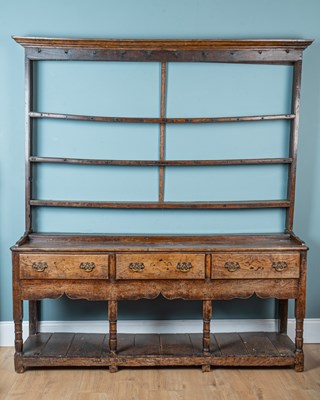 Lot 395 - An 18th century oak dresser