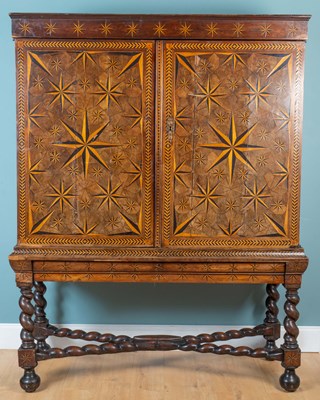 Lot 30 - An 18th century oyster-veneered cabinet on stand