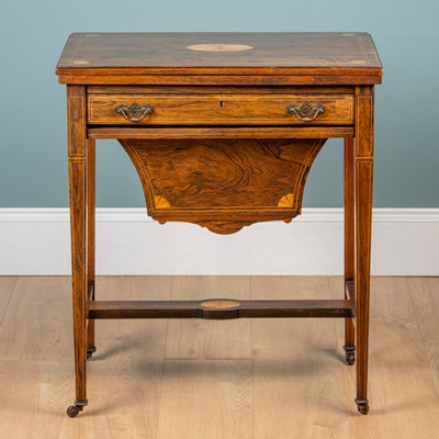 Lot 302 - A late Victorian rosewood games table and work table