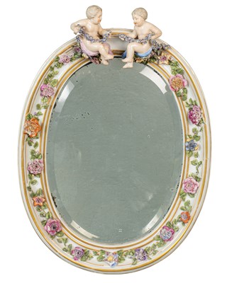 Lot 362 - A Dresden porcelain wall mirror, together with a porcelain plaque