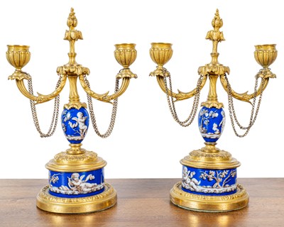 Lot 398 - A pair of Ormolou Chandelabra