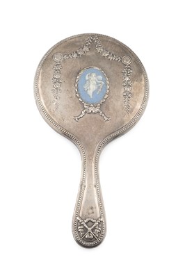 Lot 558 - An Edwardian silver hand mirror, with beaded...