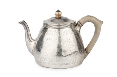 Lot 828 - A mid-Victorian silver teapot, of domed...