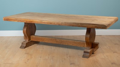 Lot 230 - A large oak French refectory table